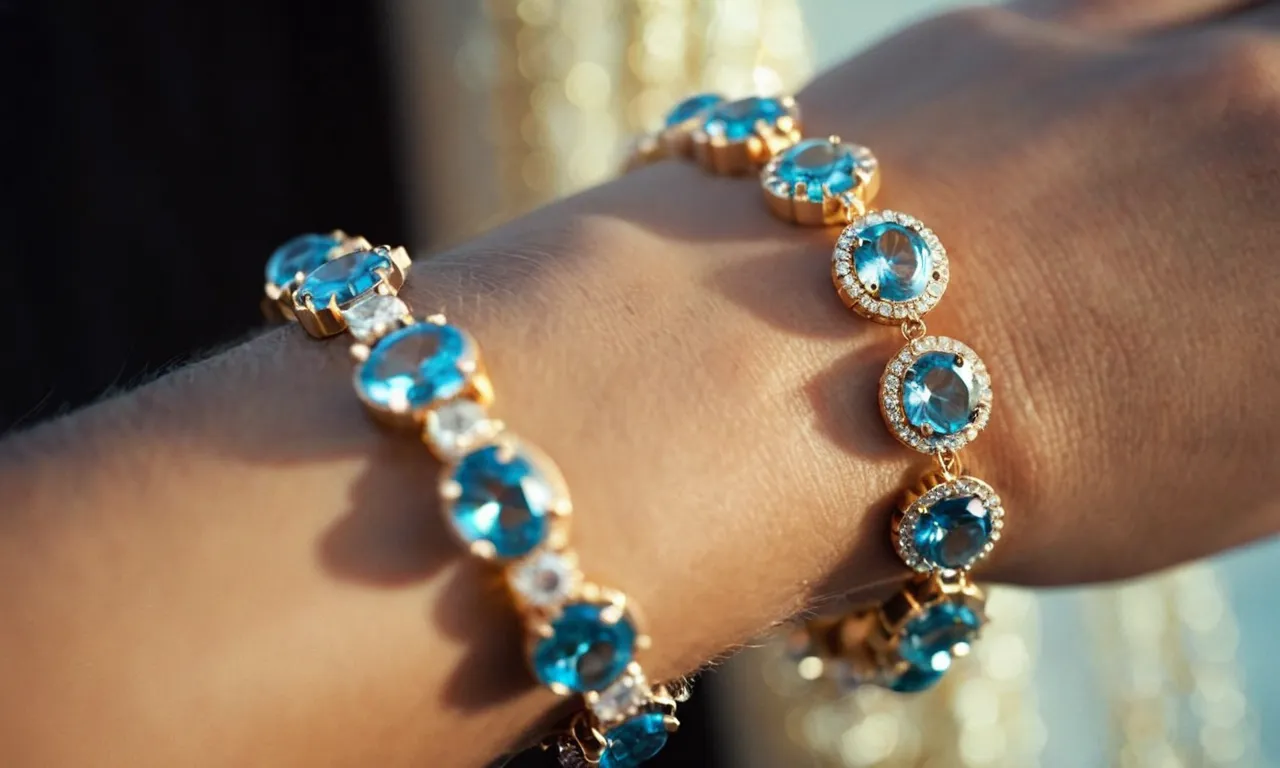 A close-up photo captures a delicate hand adorned with a shimmering crystal bracelet, reminiscent of the biblical times when people adorned themselves with precious stones for protection and divine connection.